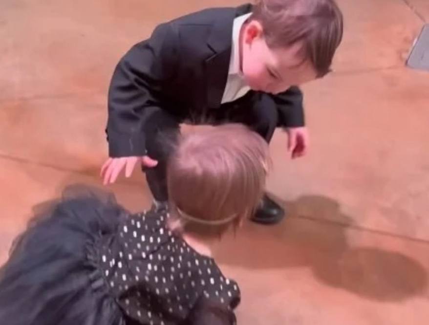 When the baby girl falls on the dance floor, the tiny guy wins the hearts of 9.9 million people by his actions